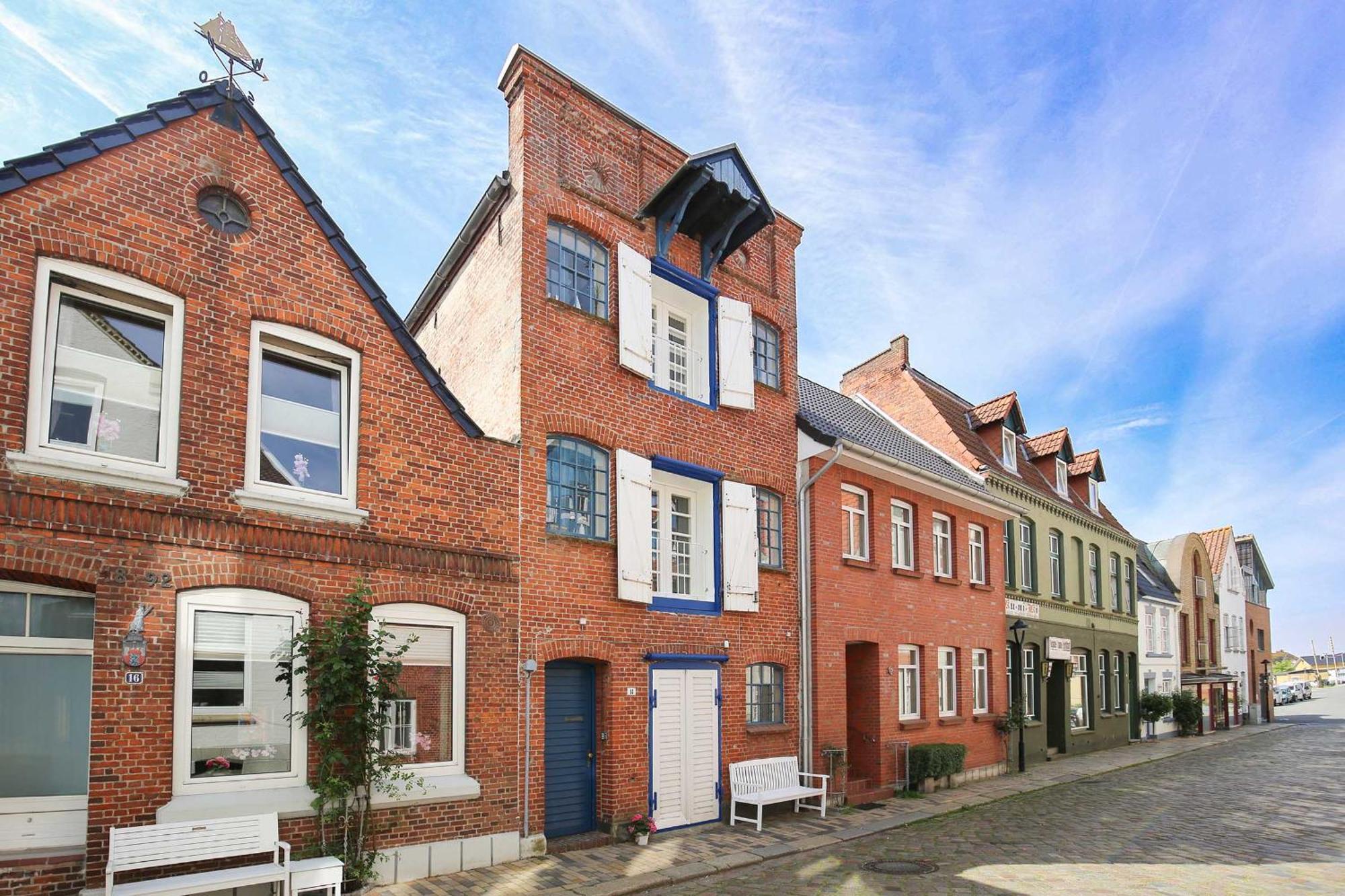 Altes Kontorhaus Kajuete Apartment Husum  Bagian luar foto